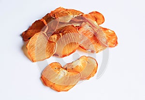 Dried persimmon or kaki fruit slices isolated on white