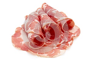 Dried pig meat slices. Delicatess.