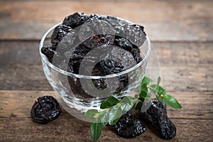 Dried plums - prunes in the bowl