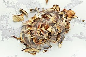 Dried porcini mushrooms on white background, texture.