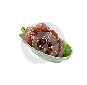 Dried preserved. Sweet syrup monkey apple or Chinese date on bac