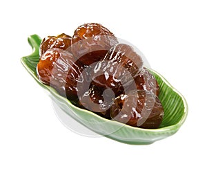 Dried preserved. Sweet syrup monkey apple or Chinese date on background