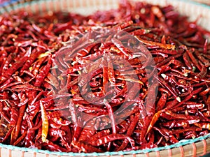 Dried red chili in the basket for sell