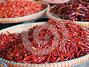 Dried red chili in the basket for sell