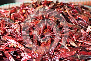 Dried red chili in the basket for sell