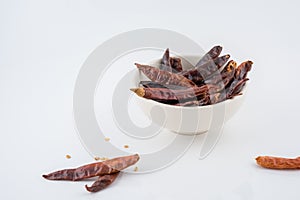 Dried red chili or chilli cayenne pepper isolated on white background , red dried chili, food ingredient for spicy cooking