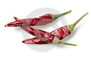 Dried red chili or chilli cayenne pepper isolated on white background cutout