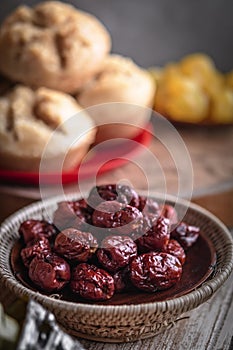 Dried red date or Chinese jujube. Traditional herbal medicine spill