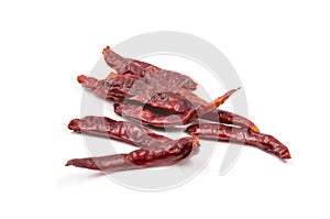 Dried red hot chili or chilli cayenne pepper isolated on white background