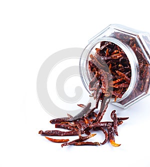 Dried Red Hot chili peppers in a glass jar, asian food ingredient