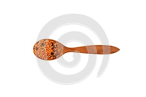 Dried Red Lentil and spices in wooden spoon isolated on white background. Masurdal or Dal. Mix of Uncooked ingredients for soup-