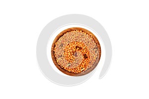 Dried Red Lentil with spicy spices in wooden bowl on white, top view. Masurdal or Dal. Mix of Uncooked ingredients for soup-mashed