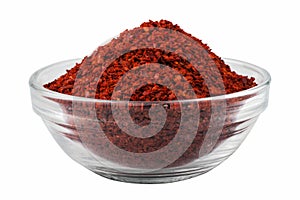 Dried red pepper, chilli flakes in a bowl, isolated on white background