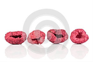 Dried red raspberry isolated on white