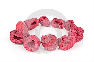 Dried red raspberry isolated on white