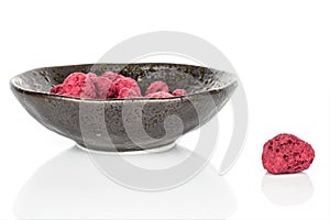 Dried red raspberry isolated on white