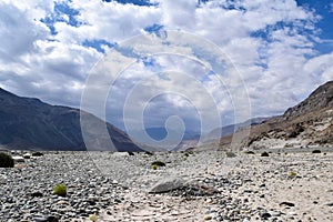 Dried river bed with river stones in a river of leh ladakh