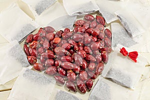 Dried rose hips forming a heart shape