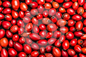 Dried rosehips background, powerful antioxidant with high content of Vitamin photo