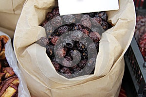 Dried rosehips. Dry fruits in paper bag. Rose hip