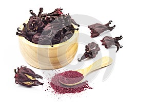 Dried Roselle flower buds in wooden bowl on white background