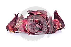 Dried roselle fruits isolated on white background.