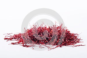 Dried saffron spice isolated on white background