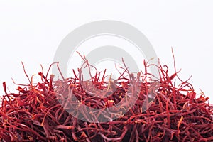 Dried saffron spice isolated on white background