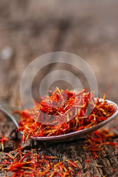 Dried saffron spice in a spoon
