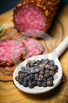 Dried salami crusted in ground red pepper