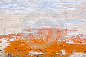 Dried saltworks in orange and white textures