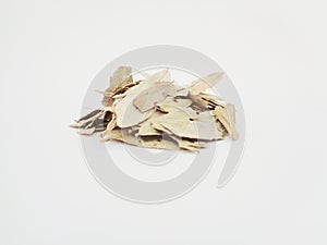 Dried Senna Alexandrina also called daun jati tiongkok, daun jati china leaves with white background. This leaves usually used a