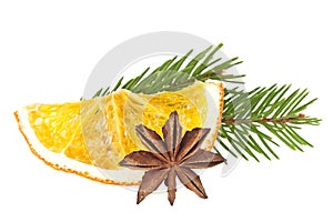 Dried slices of orange, anise star and fir tree on white background