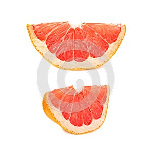 Dried small slice section of grapefruit isolated over the white background