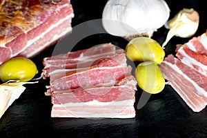 Dried and smoked slice of bacon, delicious delicatessen food