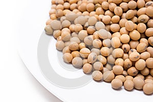 Dried soy beans on white background