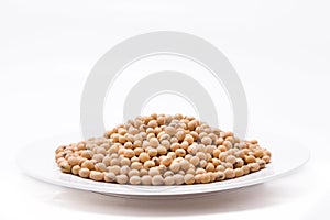 Dried soy beans on white background