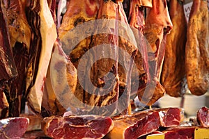 Dried spanish ham jamon in butchers shop