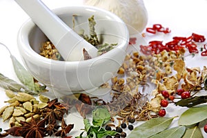 dried Spices and herbs with mortar