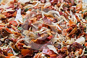 Dried spices, sun-dried tomatoes, dried carrots, Basil and Provencal herbs. Close-up Selective focus