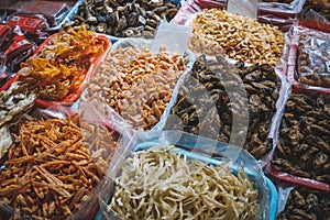 Dried squid, shellfish and seafood on fish market in Hongkong