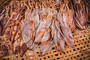 Dried squids are sold in a seafood market at Laem Chabang Fishing Village