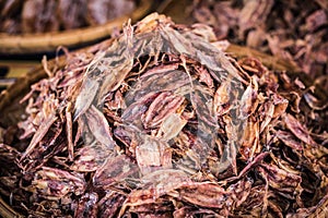 Dried squids are sold in a seafood market at Laem Chabang Fishing Village