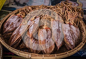 Dried squids are sold in a seafood market at Laem Chabang Fishing Village