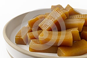 dried sweet potato sticks on white background