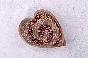 Dried tea leaves with fruits, berries and flowers