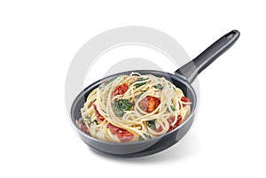 Dried tomato spinach Pasta in a pan on a white isolated background