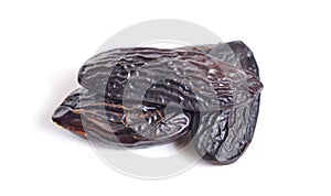 Dried tonka beans isolated on white background