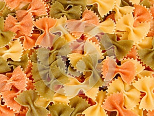 Dried tri-colored farfalle pasta