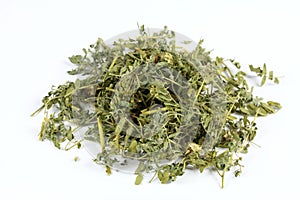 Dried Tribulus terrestris on white background